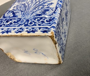 A rectangular Dutch Delft blue and white tea caddy with floral design, late 17th C.